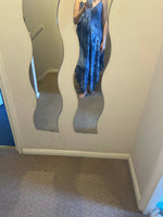 Abstract print asymmetric hem