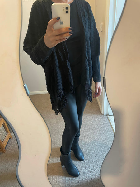 Ribbed cardigan with fringe hem
