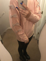 detailed bow jumper